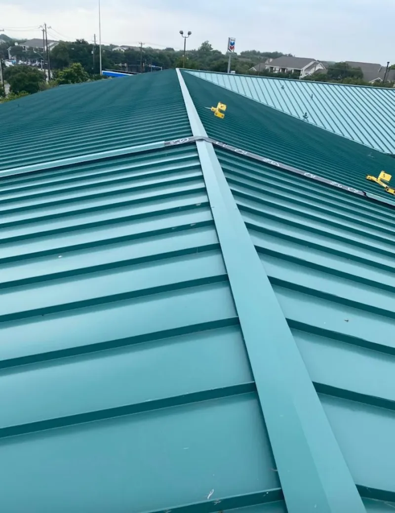 Green commercial metal roof ridge and valley for Metal Roof Repair in Cincinnati