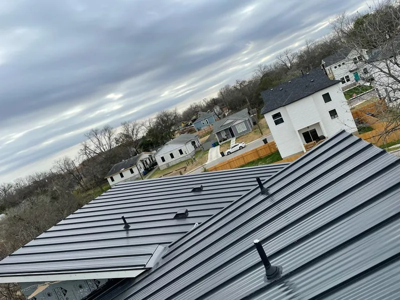Standing seam metal roof panels with vents for Skylight Repair in Cincinnati